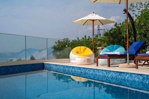 Relaxing by the pool