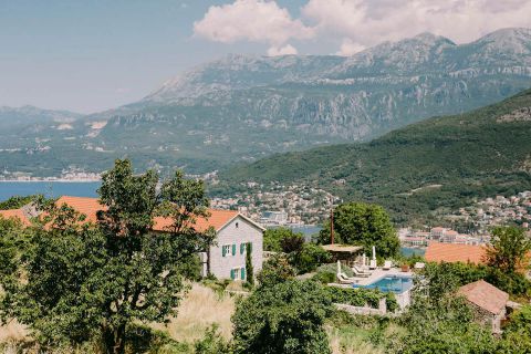 Villa with mountain backdrop and view of Kotor Bay
